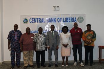 EG Tarlue (middle) flanked by CBL Board members and DGs